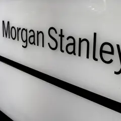 Black 3D letters spell "Morgan Stanley" on a white illuminated panel, suggesting a gateway to Morgan Stanley access investing.