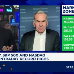Andrew Slimmon discusses market highs on CNBC, with stock tickers like Palo Alto Networks and Palantir showing significant gains.