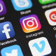 Close-up of a smartphone screen displaying various social media app icons, including Instagram, Facebook, and Viber. This image could represent the diverse digital landscape, much like a "vox etf" offers a diversified investment.