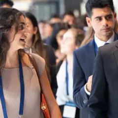 Young professionals attend a Morgan Stanley Next Level Fund event, networking and discussing future opportunities.