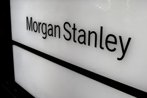 Black 3D letters spell "Morgan Stanley" on a white illuminated panel, suggesting a gateway to Morgan Stanley access investing.