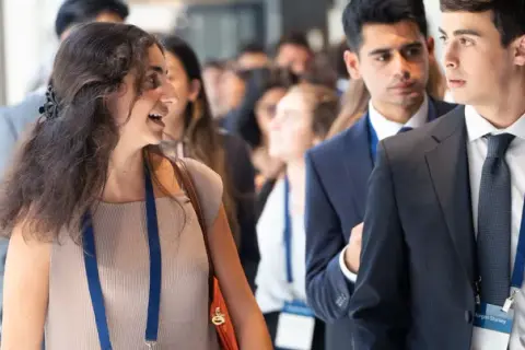 Young professionals attend a Morgan Stanley Next Level Fund event, networking and discussing future opportunities.