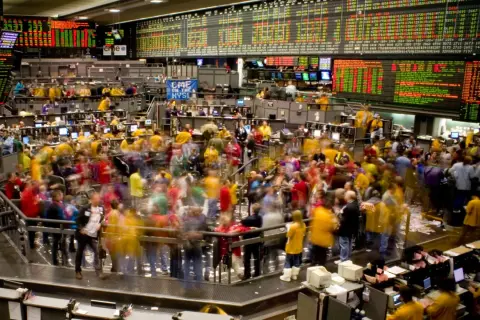 A bustling stock exchange floor, perhaps where Matt Berke of Morgan Stanley once navigated the trading frenzy.