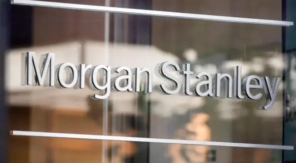 The "Morgan Stanley" logo on a glass door. This company offers a Morgan Stanley mutual fund in energy.
