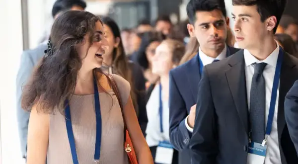 Young professionals attend a Morgan Stanley Next Level Fund event, networking and discussing future opportunities.
