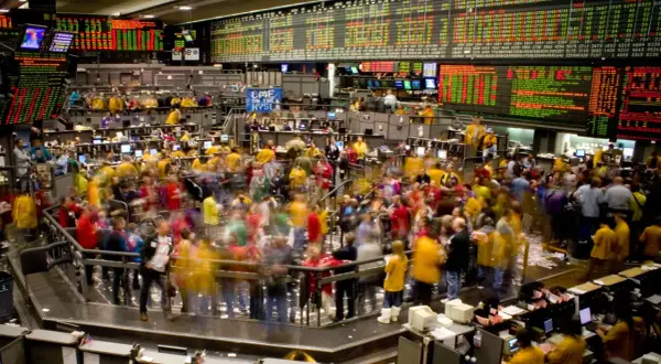 A bustling stock exchange floor, perhaps where Matt Berke of Morgan Stanley once navigated the trading frenzy.