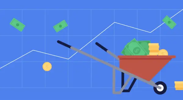 A wheelbarrow full of cash and coins on a graph, illustrating how dividends are taxed.