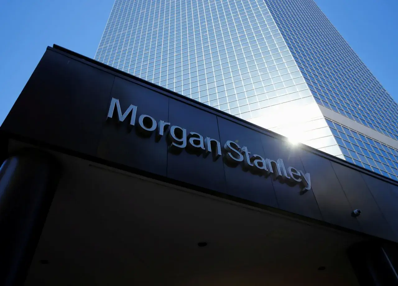 The iconic Morgan Stanley building, a symbol of financial strength and a testament to its strong credit rating, gleams under a clear blue sky.