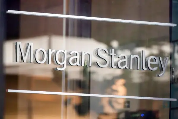 The "Morgan Stanley" logo on a glass door. This company offers a Morgan Stanley mutual fund in energy.