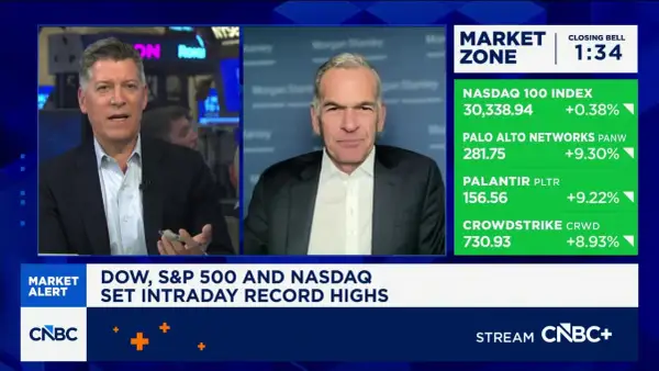 Andrew Slimmon discusses market highs on CNBC, with stock tickers like Palo Alto Networks and Palantir showing significant gains.
