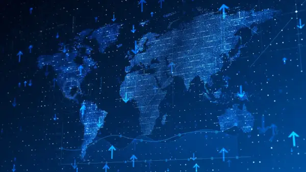 Digital world map with rising and falling arrows, suggesting global market trends and the VSS ETF's reach.