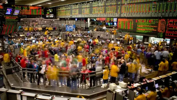 A bustling stock exchange floor, perhaps where Matt Berke of Morgan Stanley once navigated the trading frenzy.