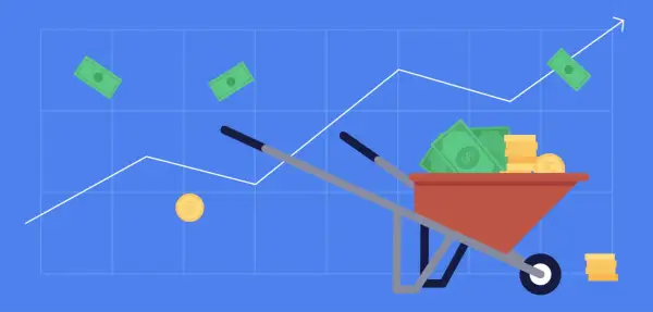 A wheelbarrow full of cash and coins on a graph, illustrating how dividends are taxed.
